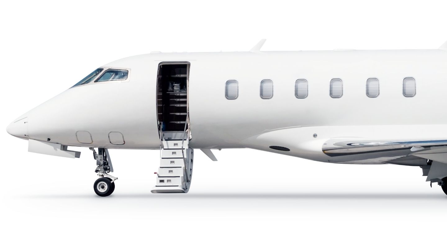 a side view of the front half of a craft jet with the steps down, waiting for passengers to board